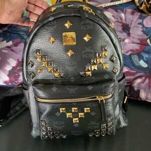 Black MCM Medium Backpack with Gold and Silver Studds